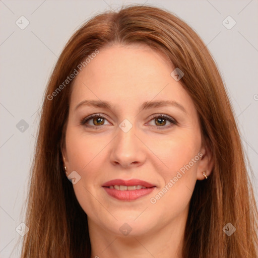 Joyful white adult female with long  brown hair and brown eyes