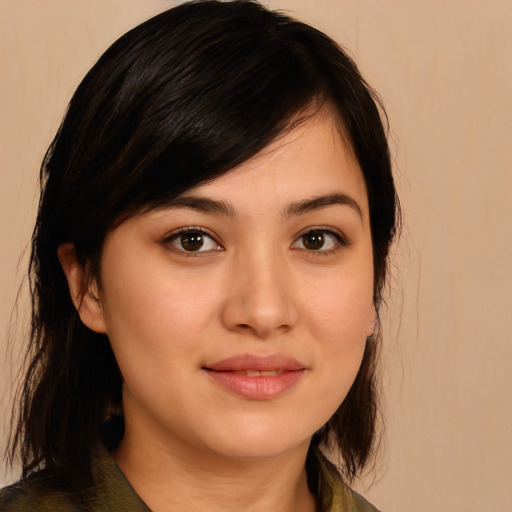 Joyful white young-adult female with medium  black hair and brown eyes