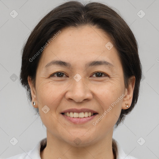 Joyful white adult female with medium  brown hair and brown eyes