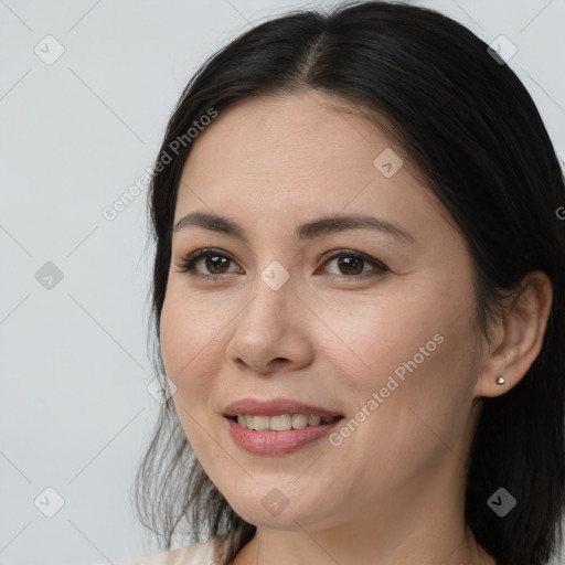 Joyful white young-adult female with medium  brown hair and brown eyes