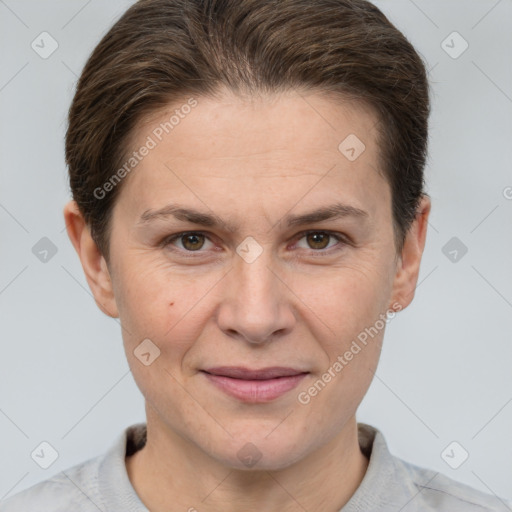 Joyful white adult female with short  brown hair and brown eyes