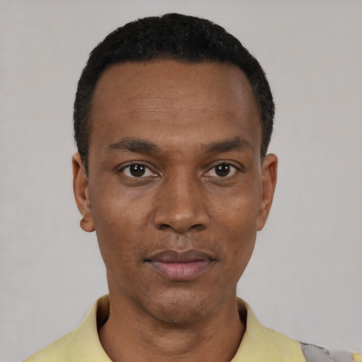 Neutral black young-adult male with short  black hair and brown eyes
