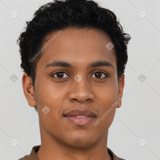 Joyful latino young-adult male with short  brown hair and brown eyes