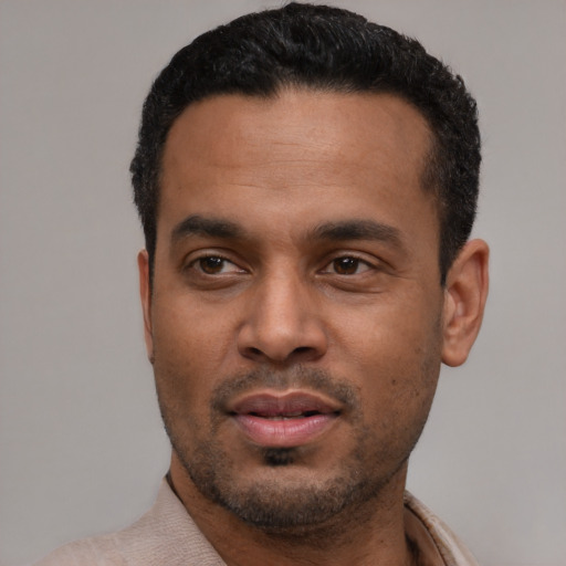 Neutral latino young-adult male with short  black hair and brown eyes
