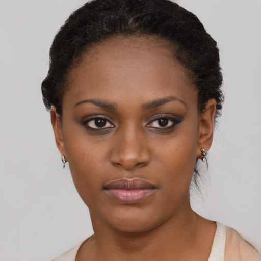 Neutral black young-adult female with short  brown hair and brown eyes