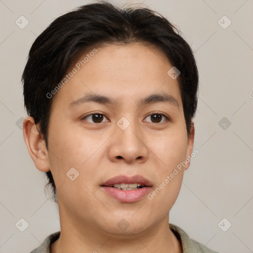 Joyful asian young-adult male with short  brown hair and brown eyes