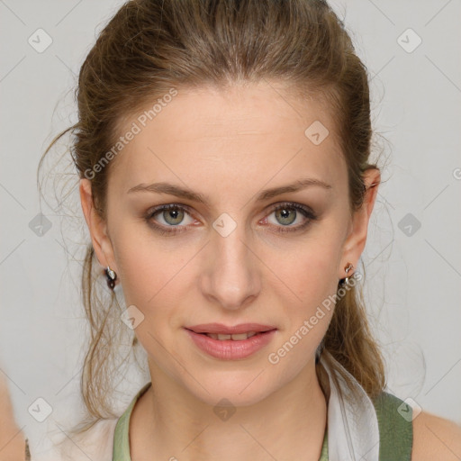 Joyful white young-adult female with medium  brown hair and green eyes