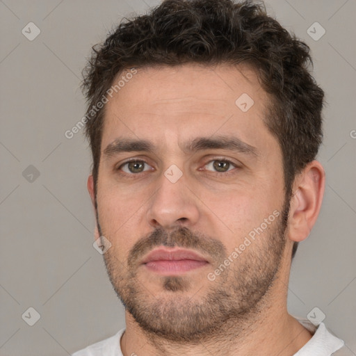 Neutral white adult male with short  brown hair and brown eyes