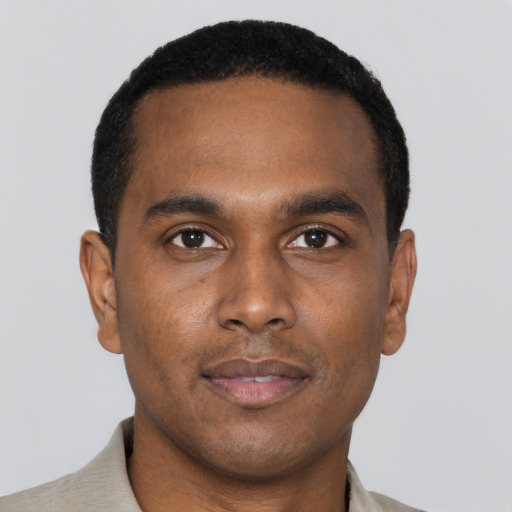 Neutral black young-adult male with short  black hair and brown eyes
