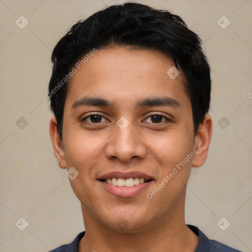 Joyful latino young-adult male with short  black hair and brown eyes