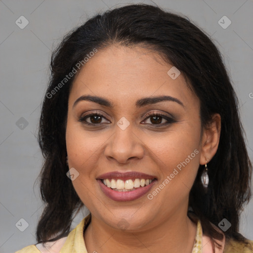 Joyful latino young-adult female with medium  brown hair and brown eyes