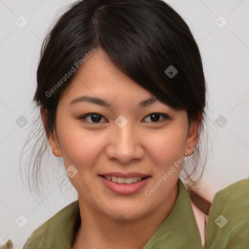 Joyful asian young-adult female with medium  brown hair and brown eyes