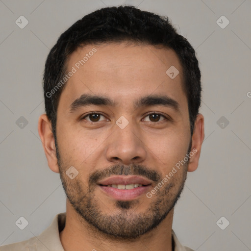 Joyful latino young-adult male with short  black hair and brown eyes