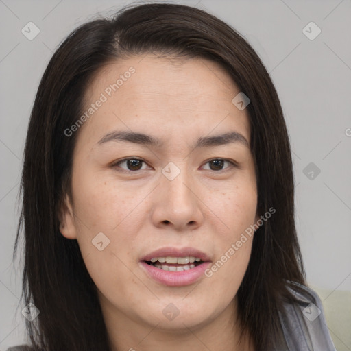 Joyful asian young-adult female with medium  brown hair and brown eyes