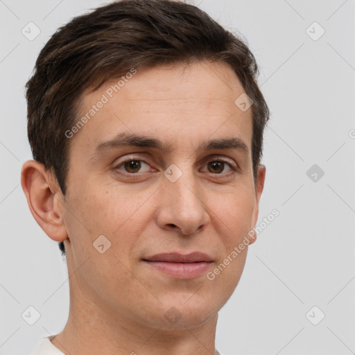 Joyful white adult male with short  brown hair and brown eyes