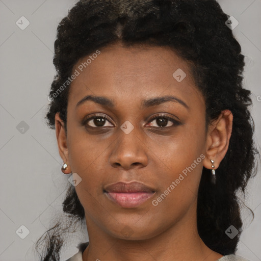 Neutral black young-adult female with short  black hair and brown eyes