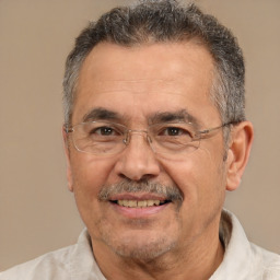 Joyful white middle-aged male with short  brown hair and brown eyes