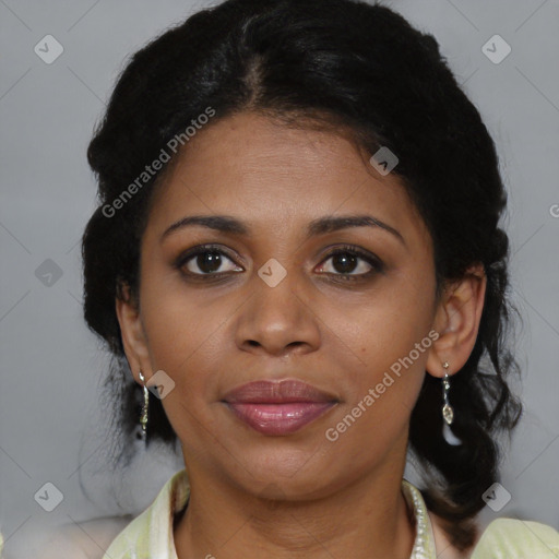 Joyful black adult female with medium  brown hair and brown eyes