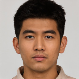 Neutral asian young-adult male with short  black hair and brown eyes