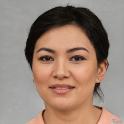 Joyful white young-adult female with medium  brown hair and brown eyes