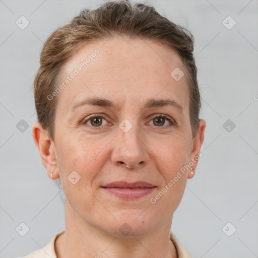 Joyful white adult female with short  brown hair and brown eyes