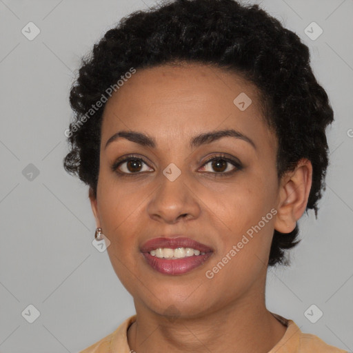 Joyful black young-adult female with short  brown hair and brown eyes