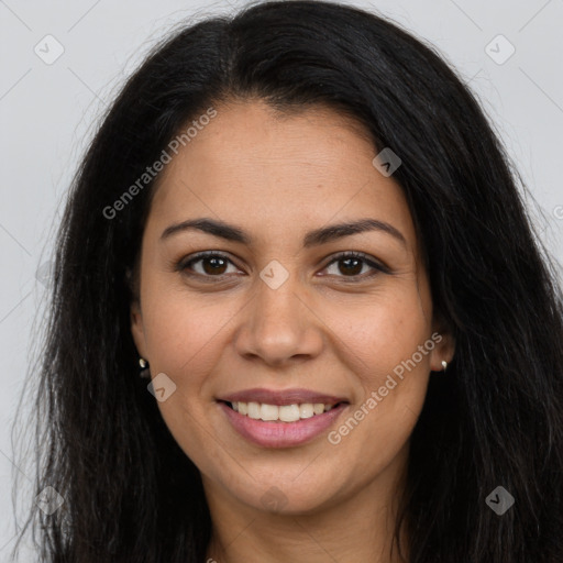 Joyful latino young-adult female with long  brown hair and brown eyes