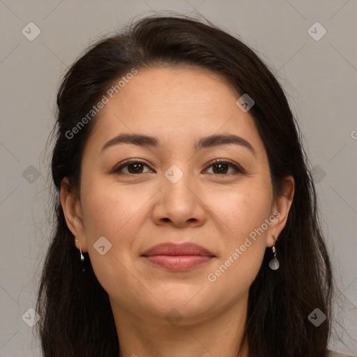 Joyful white adult female with long  brown hair and brown eyes