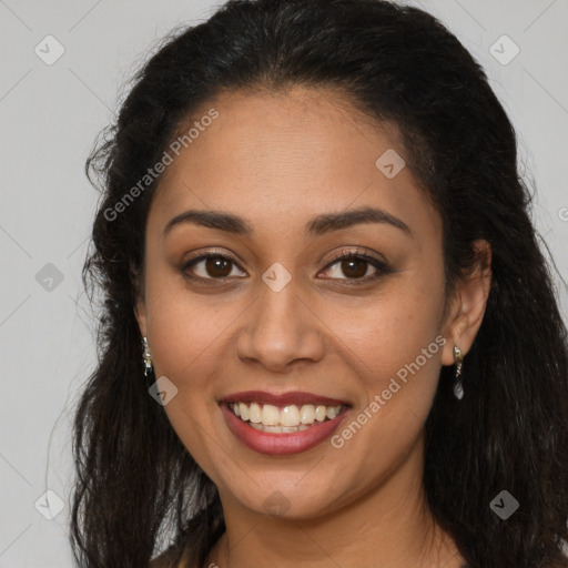 Joyful latino young-adult female with long  brown hair and brown eyes