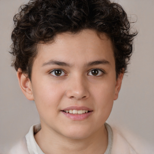 Joyful white child male with short  brown hair and brown eyes