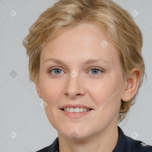 Joyful white young-adult female with medium  brown hair and blue eyes