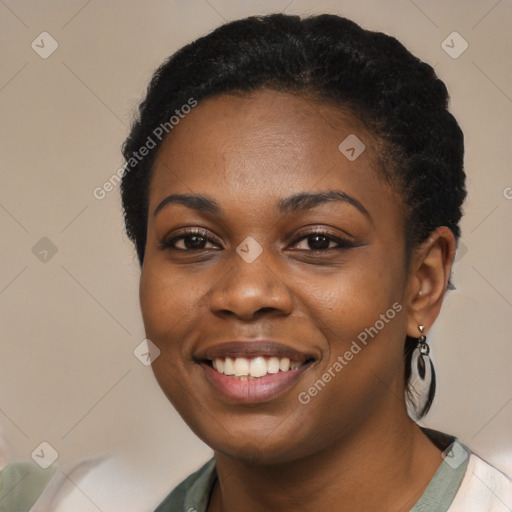 Joyful black young-adult female with short  black hair and brown eyes