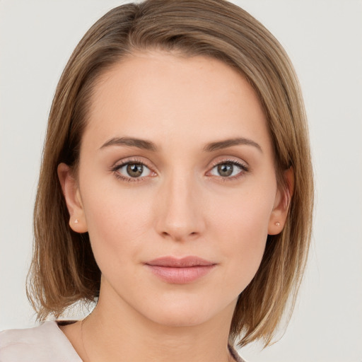 Neutral white young-adult female with medium  brown hair and grey eyes