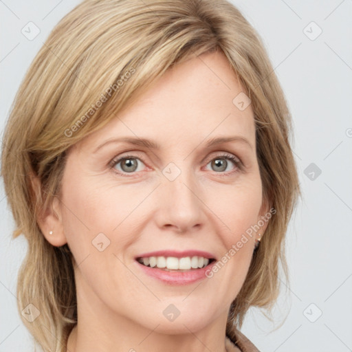 Joyful white young-adult female with medium  brown hair and blue eyes