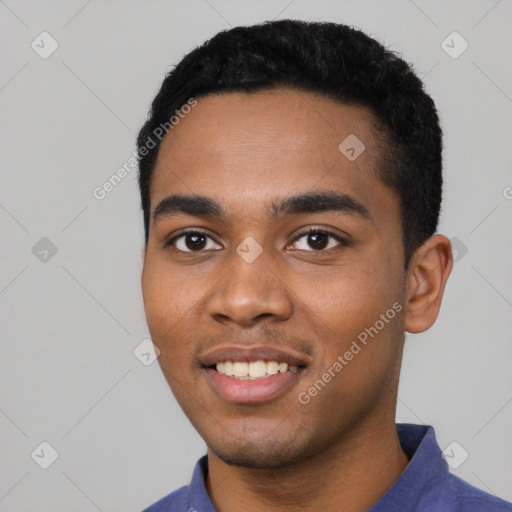 Joyful black young-adult male with short  black hair and brown eyes