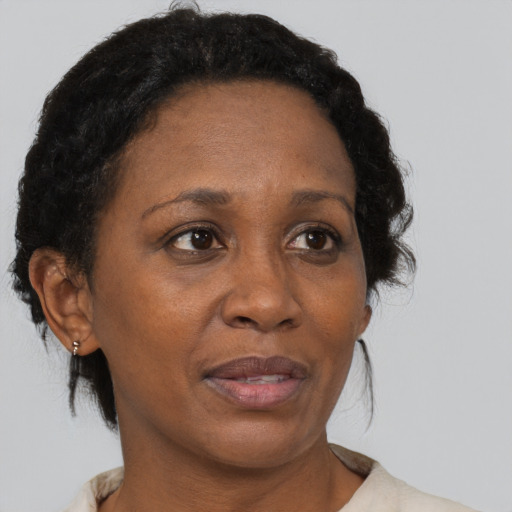 Neutral black adult female with short  brown hair and brown eyes