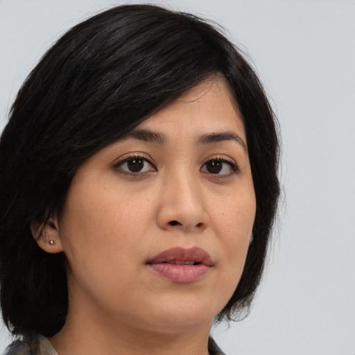 Neutral asian young-adult female with medium  black hair and brown eyes
