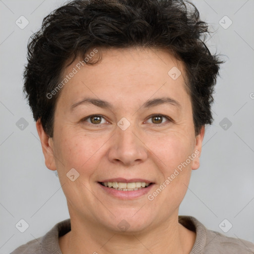 Joyful white adult female with short  brown hair and brown eyes