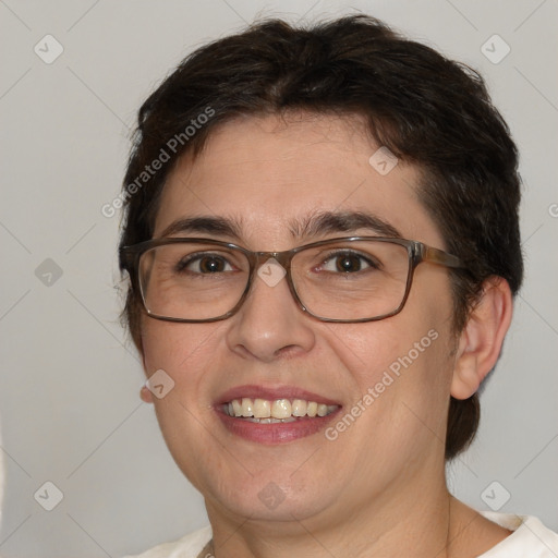 Joyful white adult female with short  brown hair and brown eyes