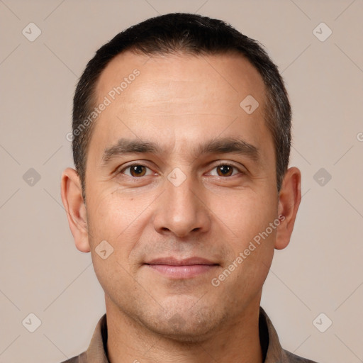 Joyful white young-adult male with short  brown hair and brown eyes