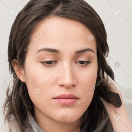 Neutral white young-adult female with medium  brown hair and brown eyes