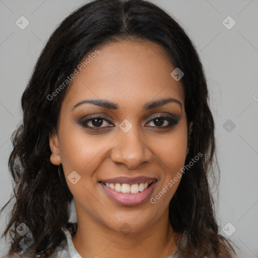 Joyful black young-adult female with long  brown hair and brown eyes