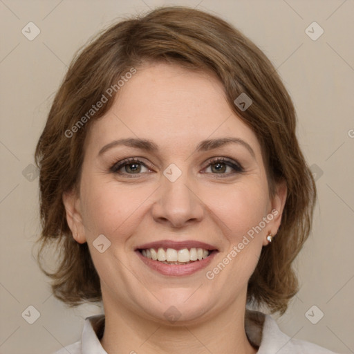 Joyful white young-adult female with medium  brown hair and green eyes