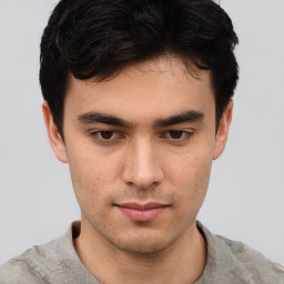 Neutral asian young-adult male with short  brown hair and brown eyes