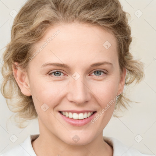 Joyful white young-adult female with medium  brown hair and blue eyes