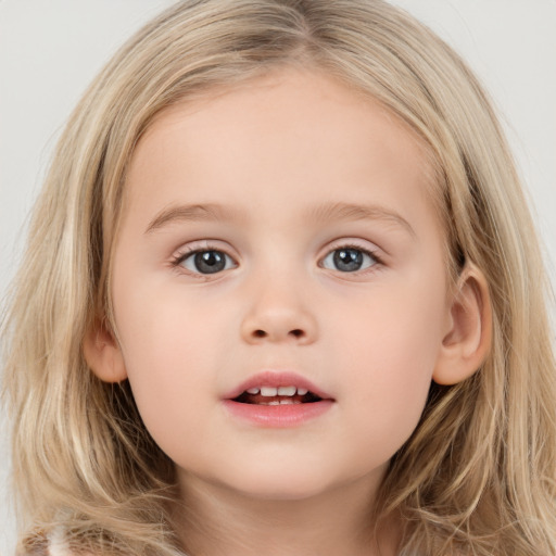 Joyful white child female with long  brown hair and grey eyes