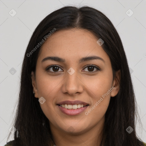 Joyful latino young-adult female with long  brown hair and brown eyes