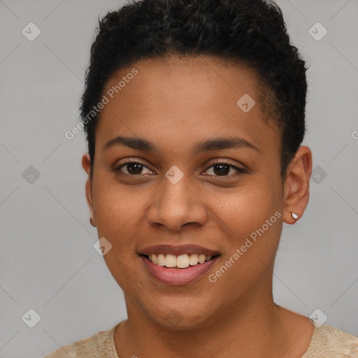 Joyful latino young-adult female with short  brown hair and brown eyes