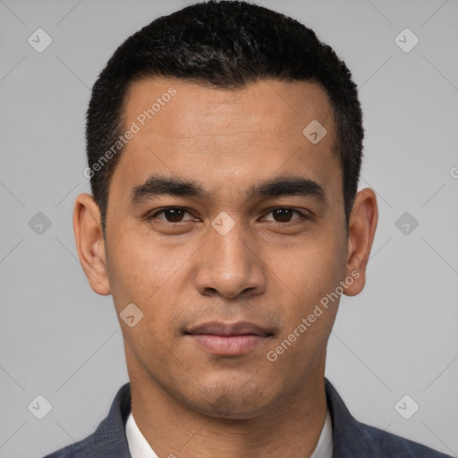 Joyful white young-adult male with short  black hair and brown eyes