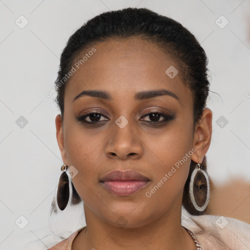 Joyful latino young-adult female with short  brown hair and brown eyes